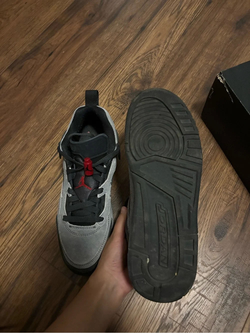 Jordan Grey and Black Sneakers with Red Jumpman Accents